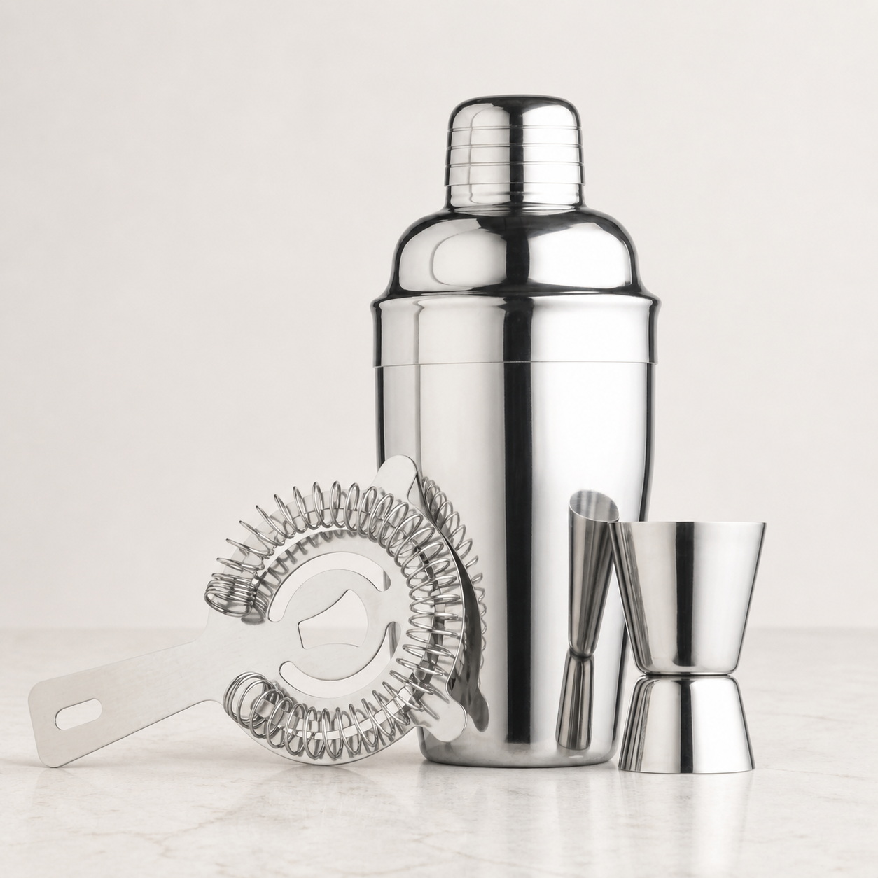 Four-Piece Stainless Steel Cocktail Shaker and Strainer Set