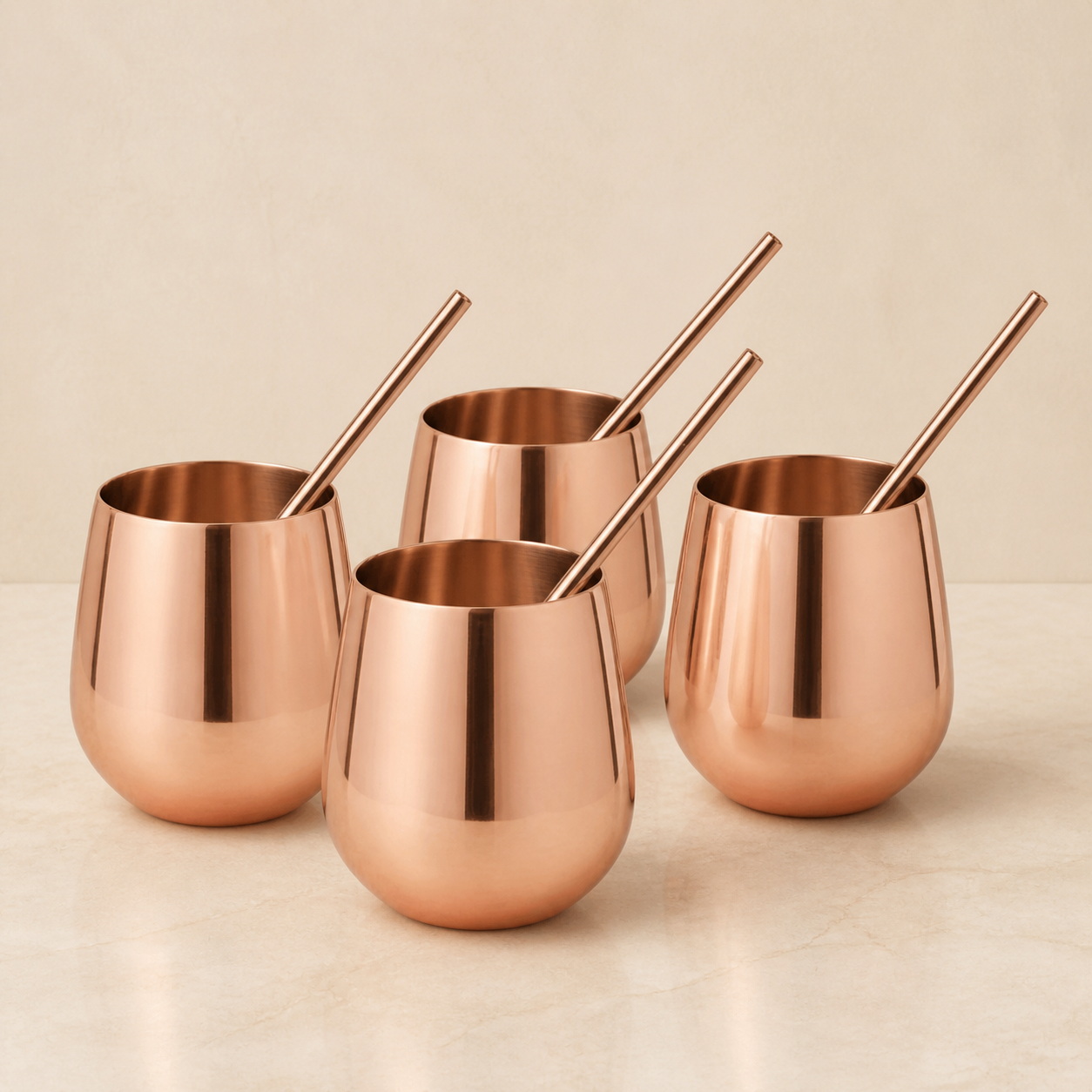 Four-Piece Copper-Tone Stemless Tumbler Set with Reusable Straws